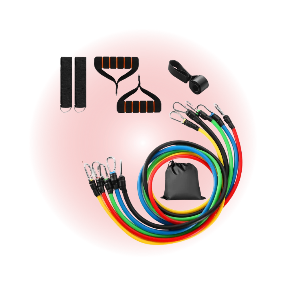 Set of resistance bands and accessories on a pink background